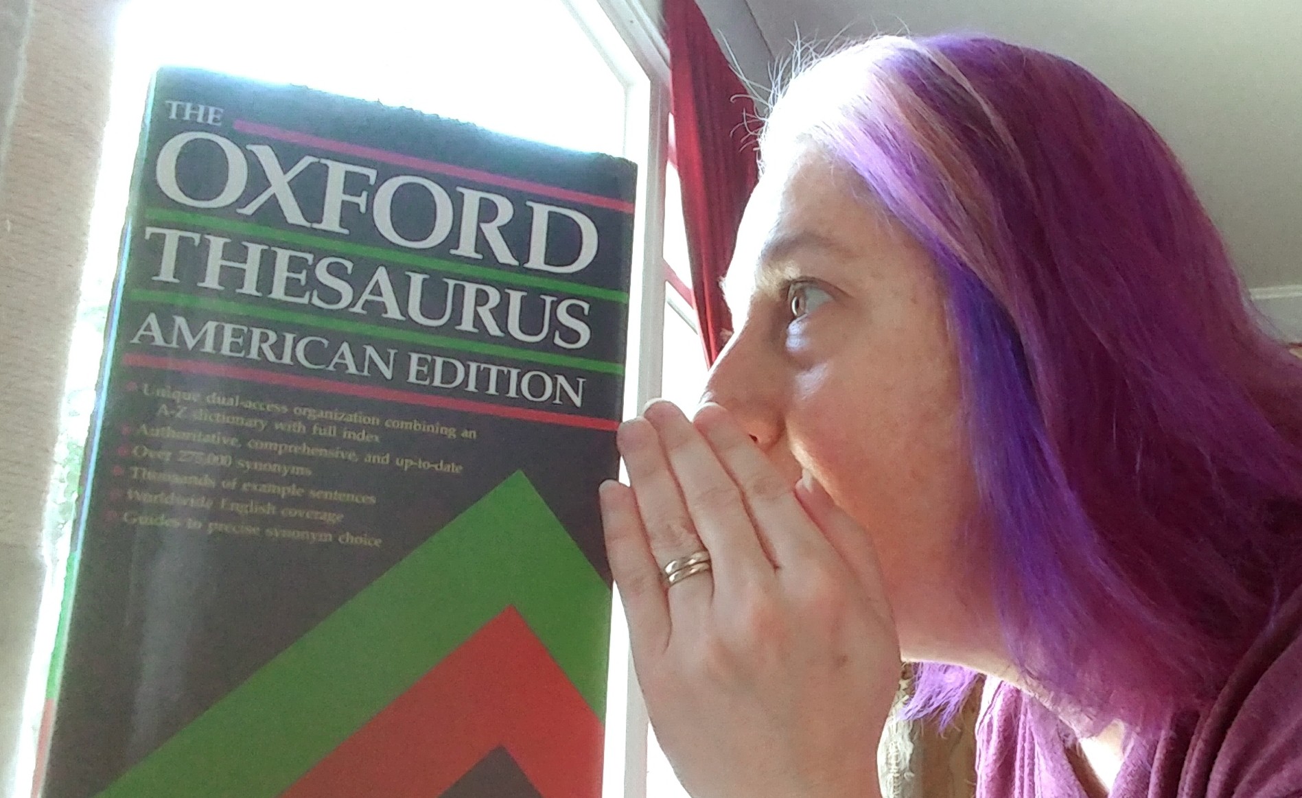 Dori Salzman whispering into a thesaurus